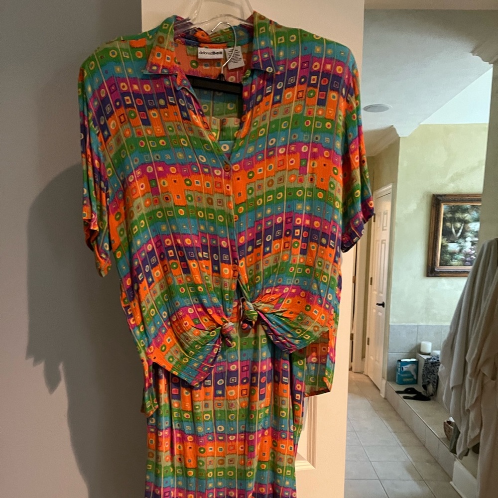 Vacation? You need this multi color airy tunic top and flirty skirt!